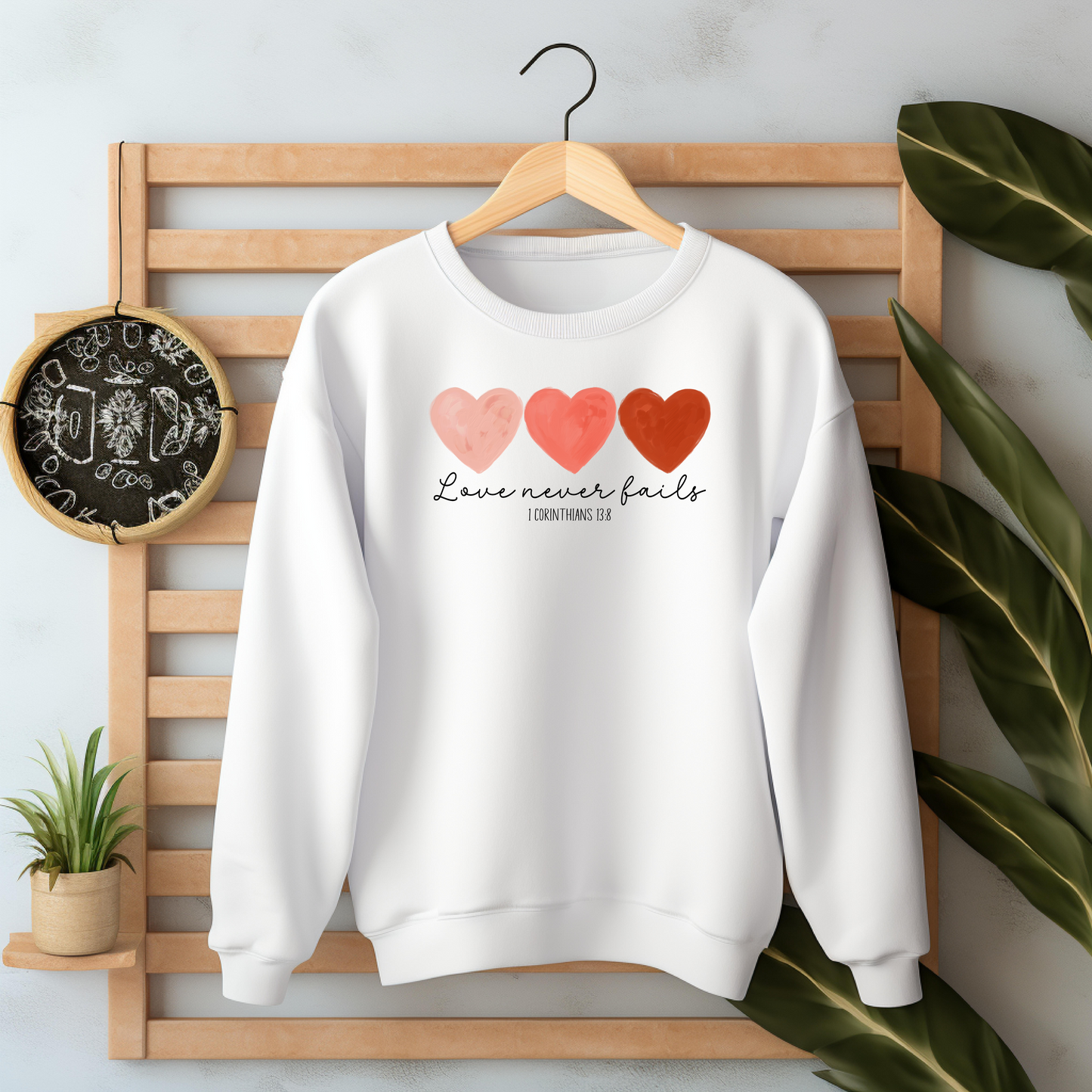 Love Never Fails Unisex Sweatshirts