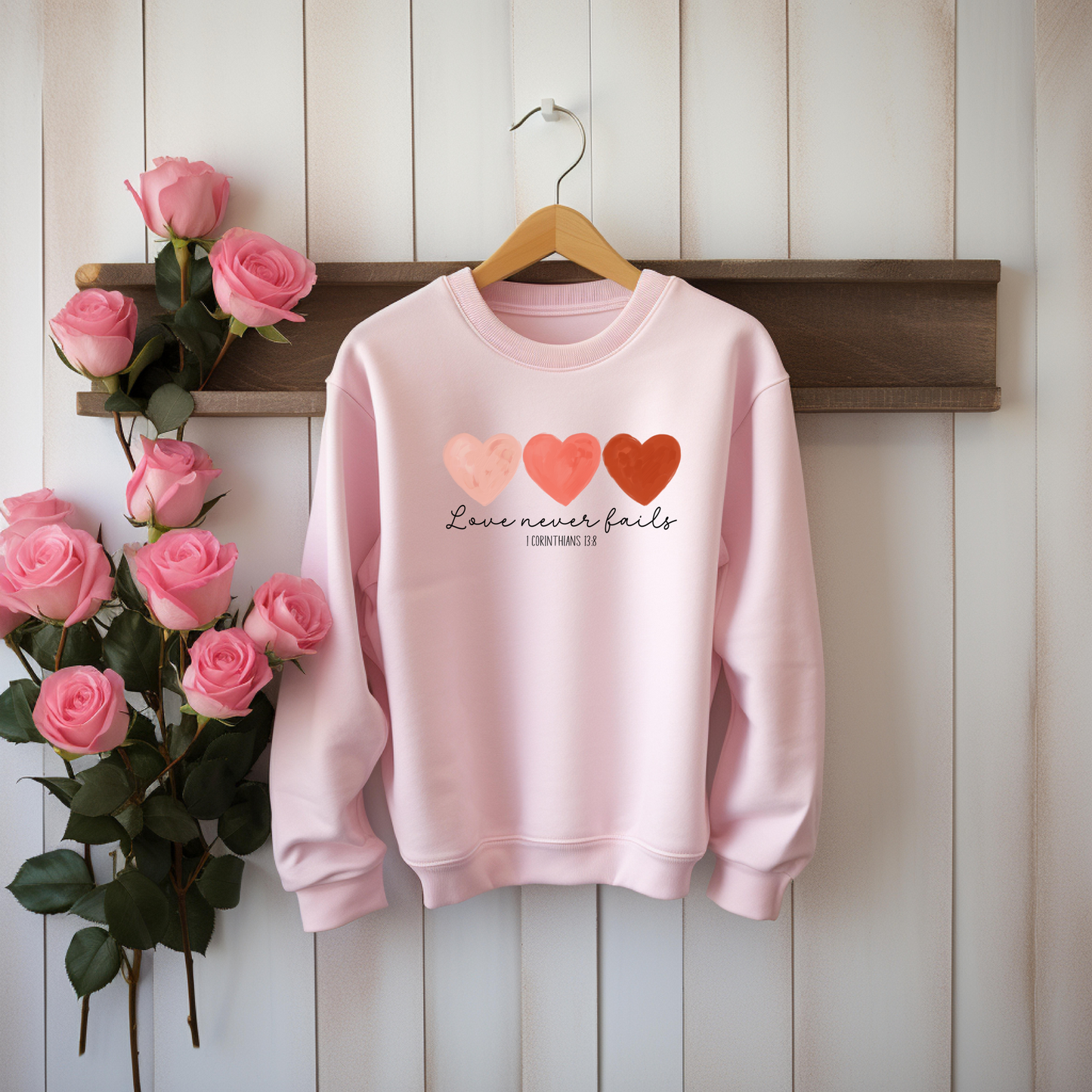 Love Never Fails Unisex Sweatshirts